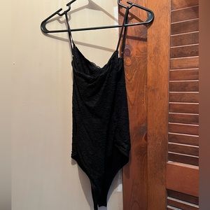 Cross backed black lace body suit